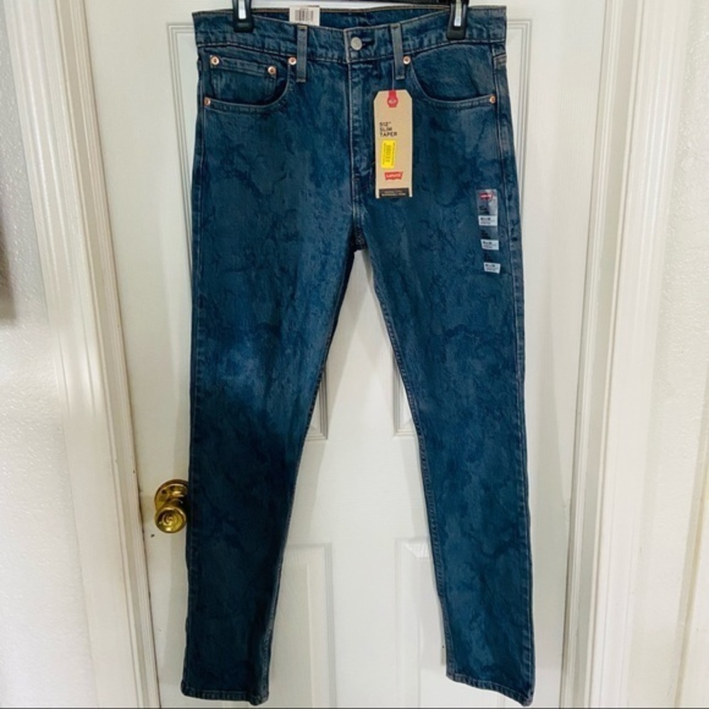 NWT LEVIS acid wash slim taper denim stretch jeans sits below waist size 32